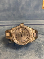 Rolex Datejust . Rose Gold . Diamond Bezel . Silver Roman Dial . President Bracelet