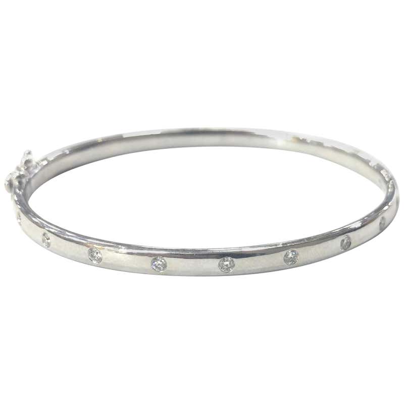 9 Carat White Gold Solid Hinged Diamond Bangle
