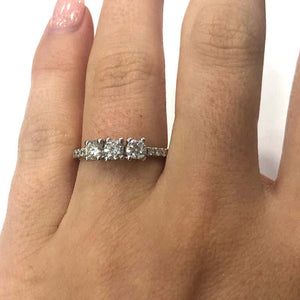 18 Carat White Gold Three-Stone Diamond Ring with Full Diamond Set Shank
