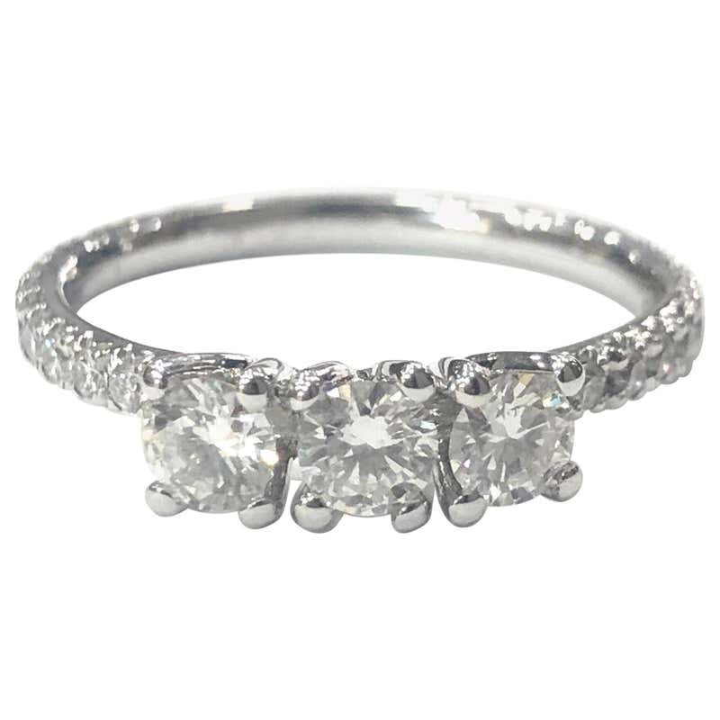 18 Carat White Gold Three-Stone Diamond Ring with Full Diamond Set Shank